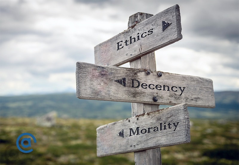 Sign reads ethics, decency, morality, in different directions